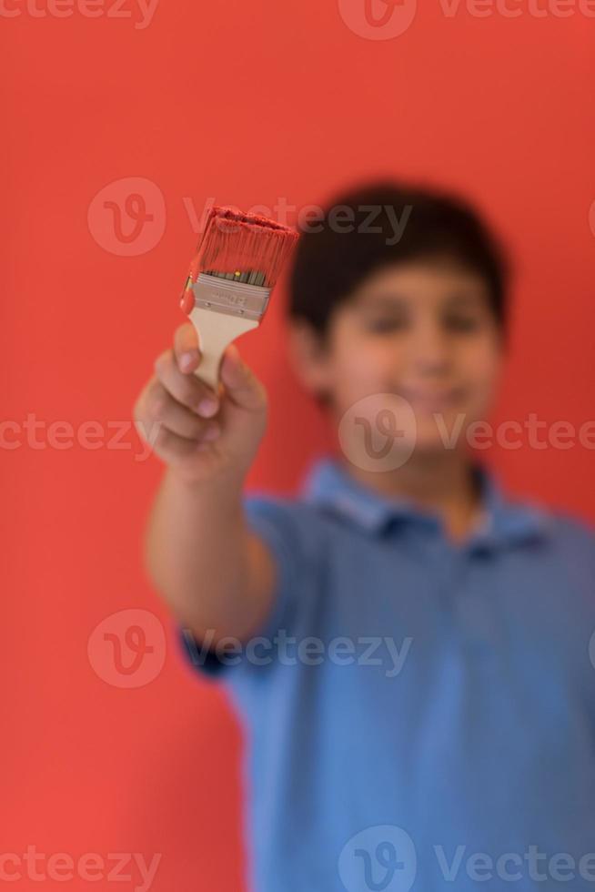 Portrait of a happy young boy painter photo