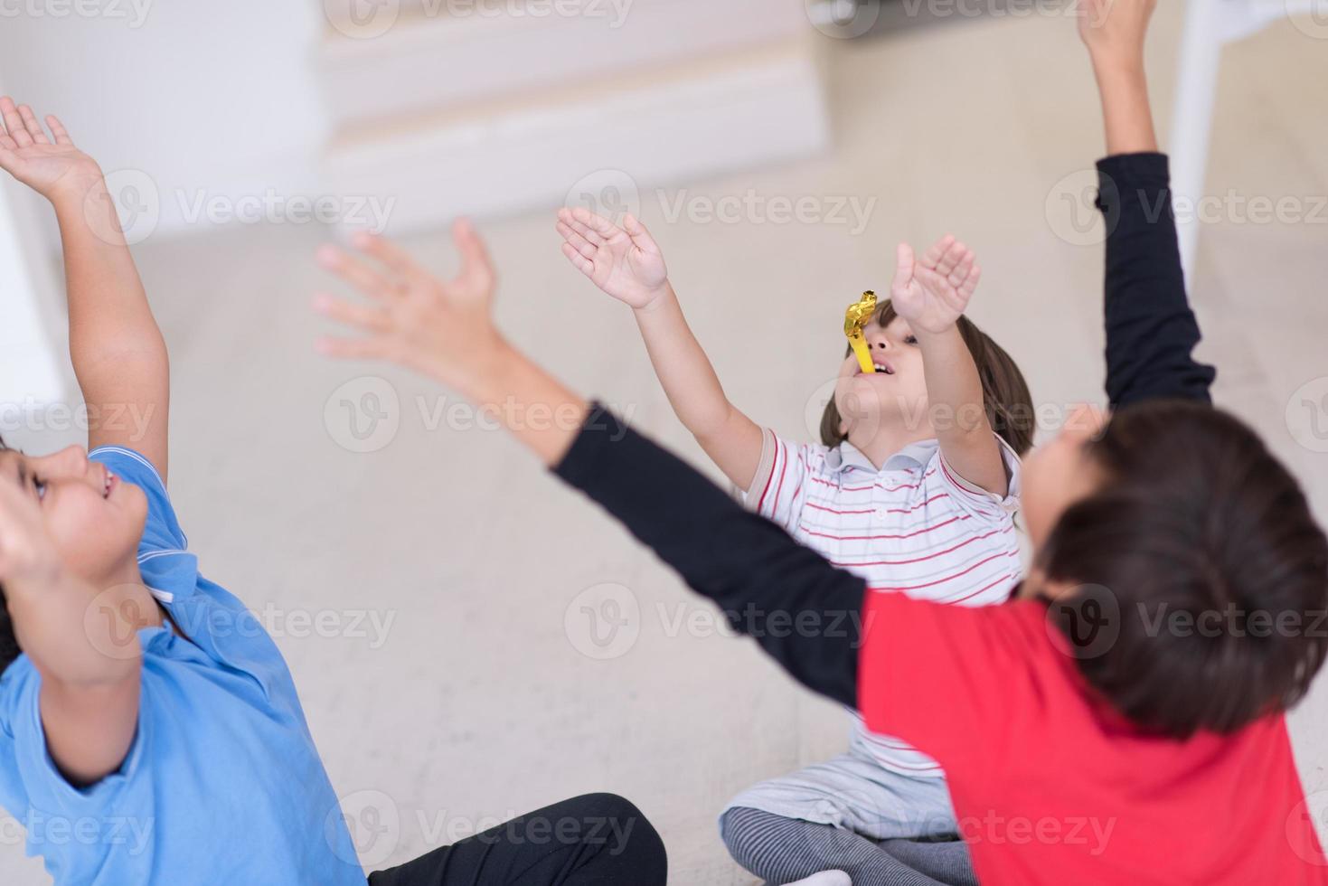 young boys having fun on the floor photo
