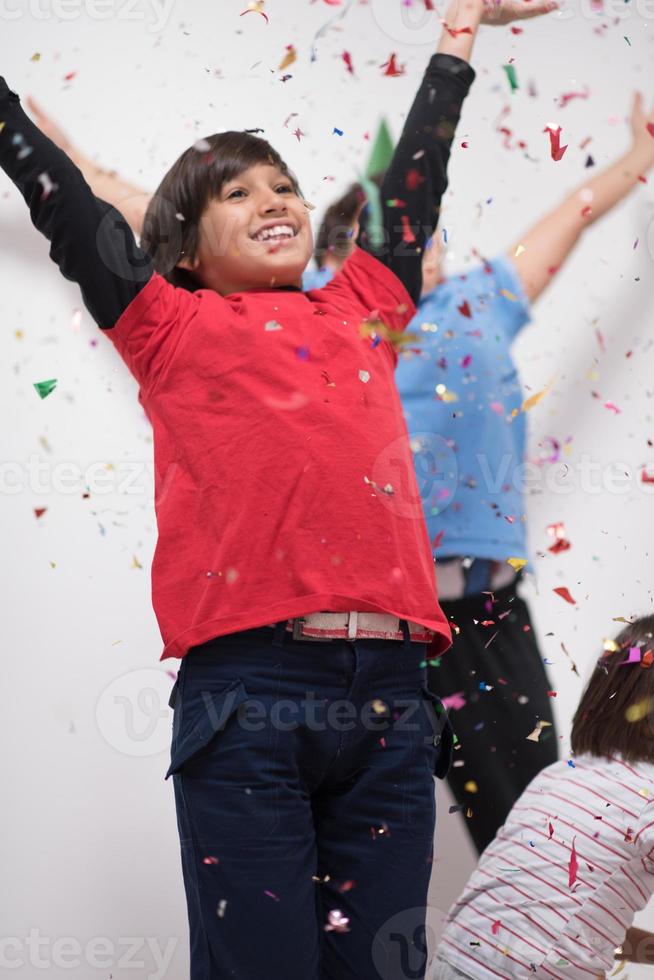 kids  blowing confetti photo