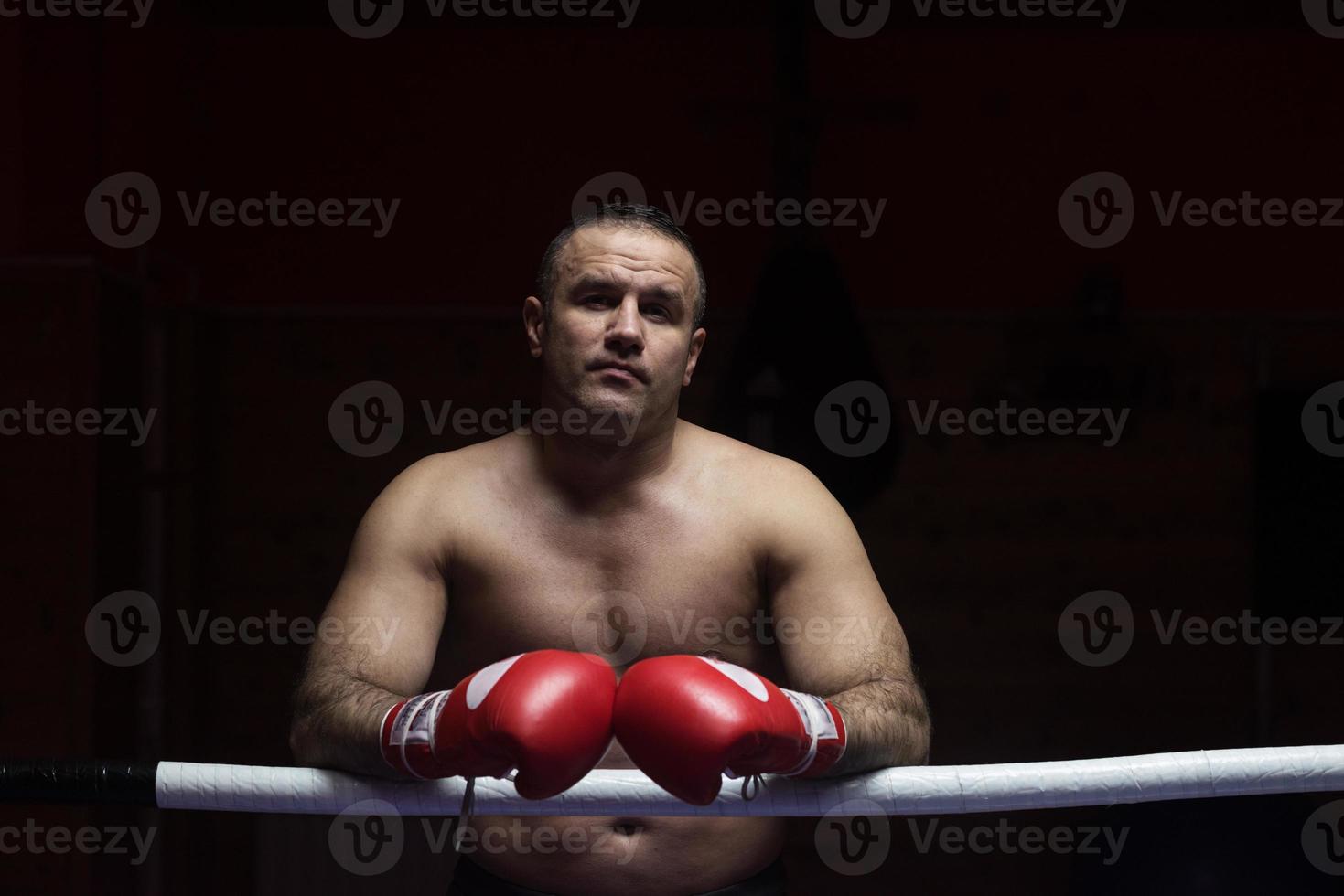 portrait of muscular professional kickboxer photo