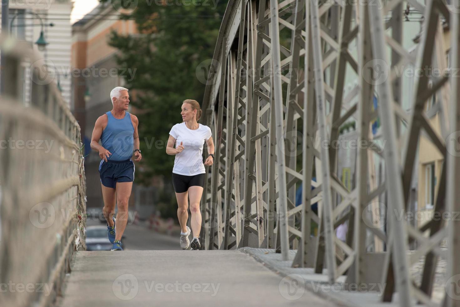 Couple jogging outside photo