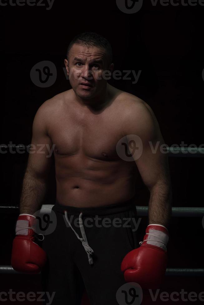 portrait of muscular professional kickboxer photo