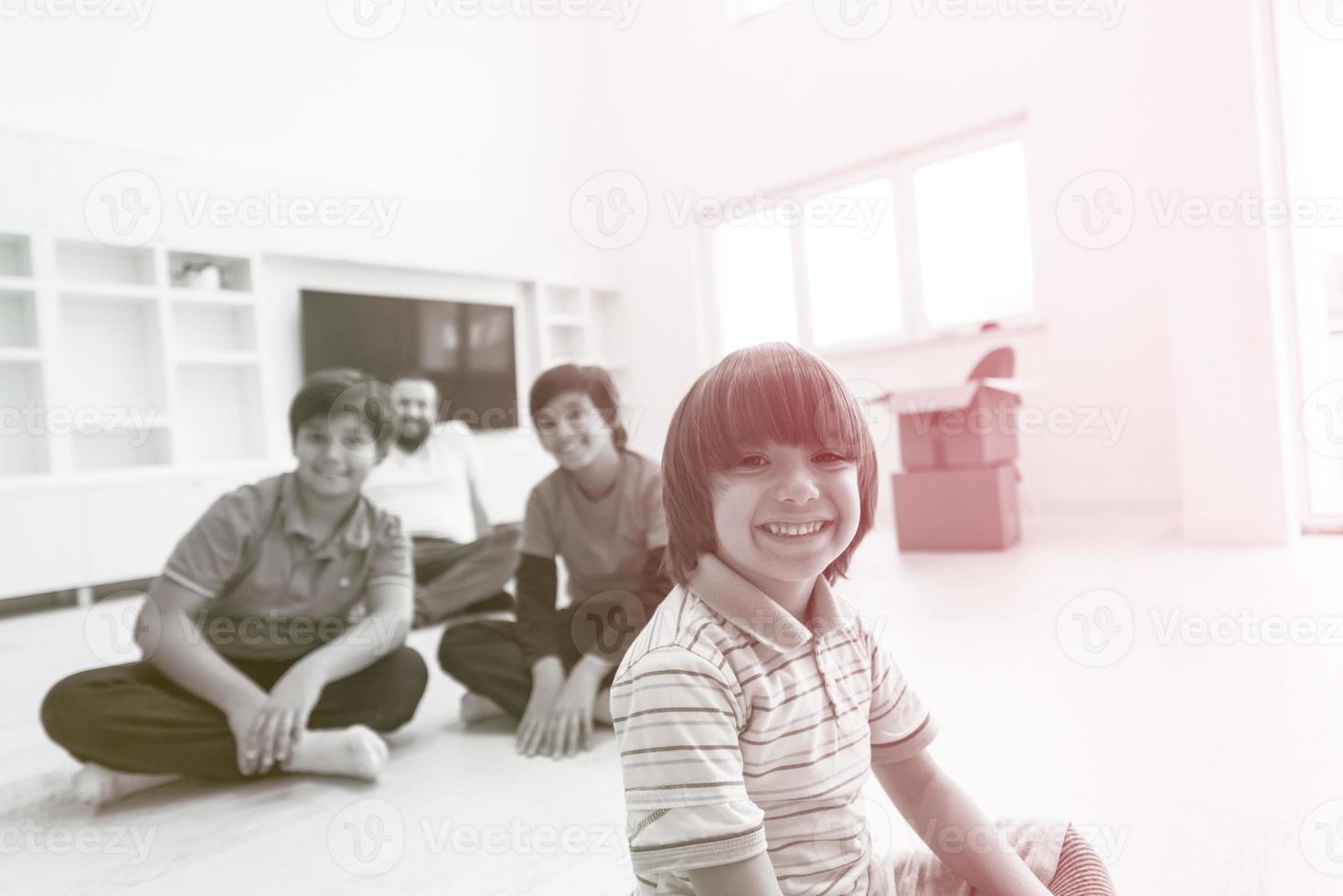 portrait of happy young boys with their dad photo