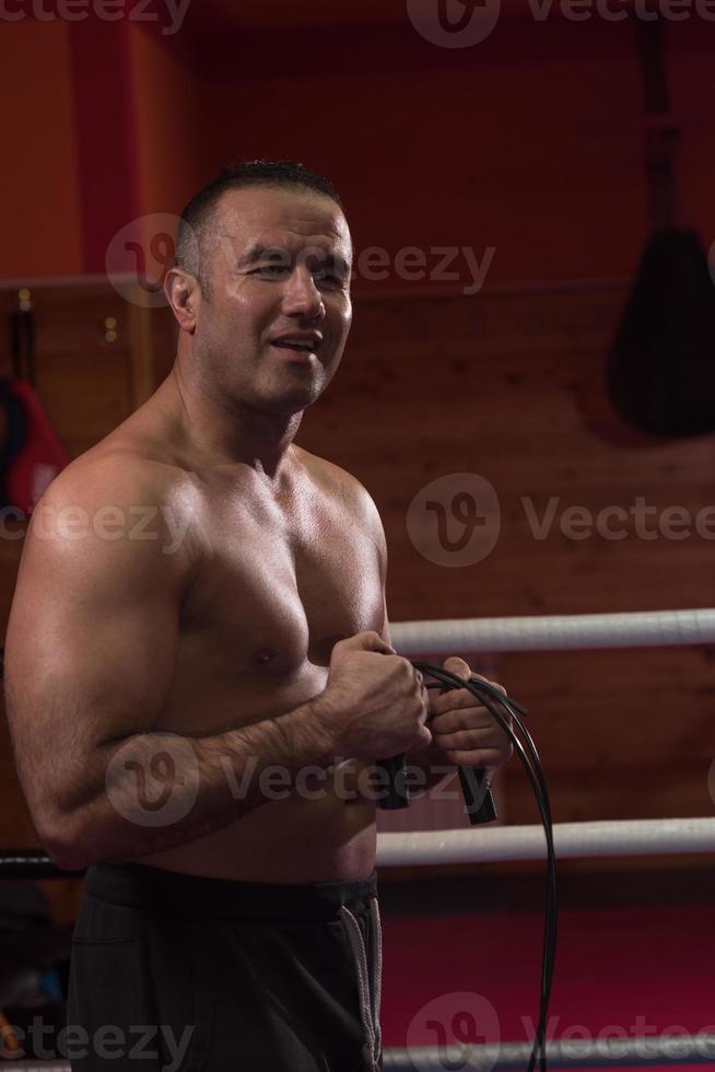 portrait of muscular professional kickboxer photo