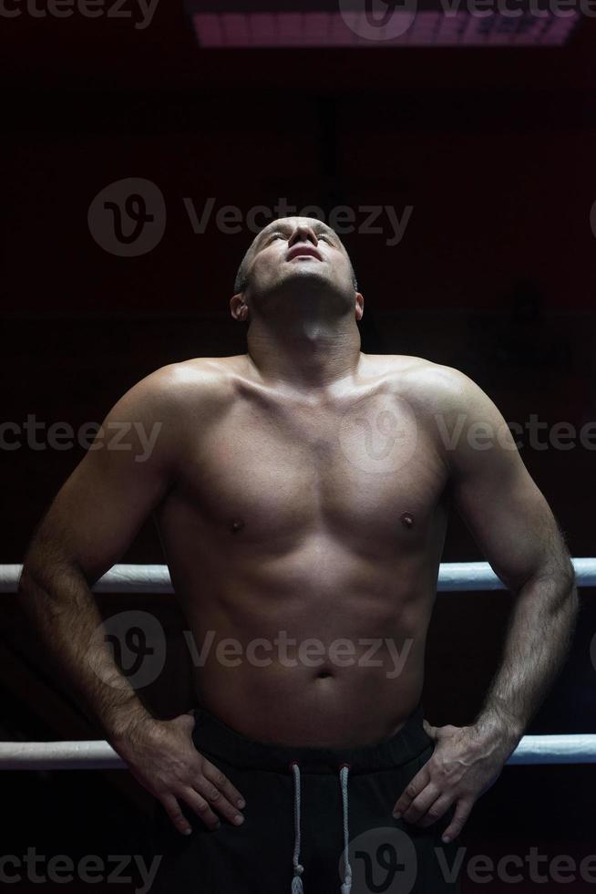 portrait of muscular professional kickboxer photo