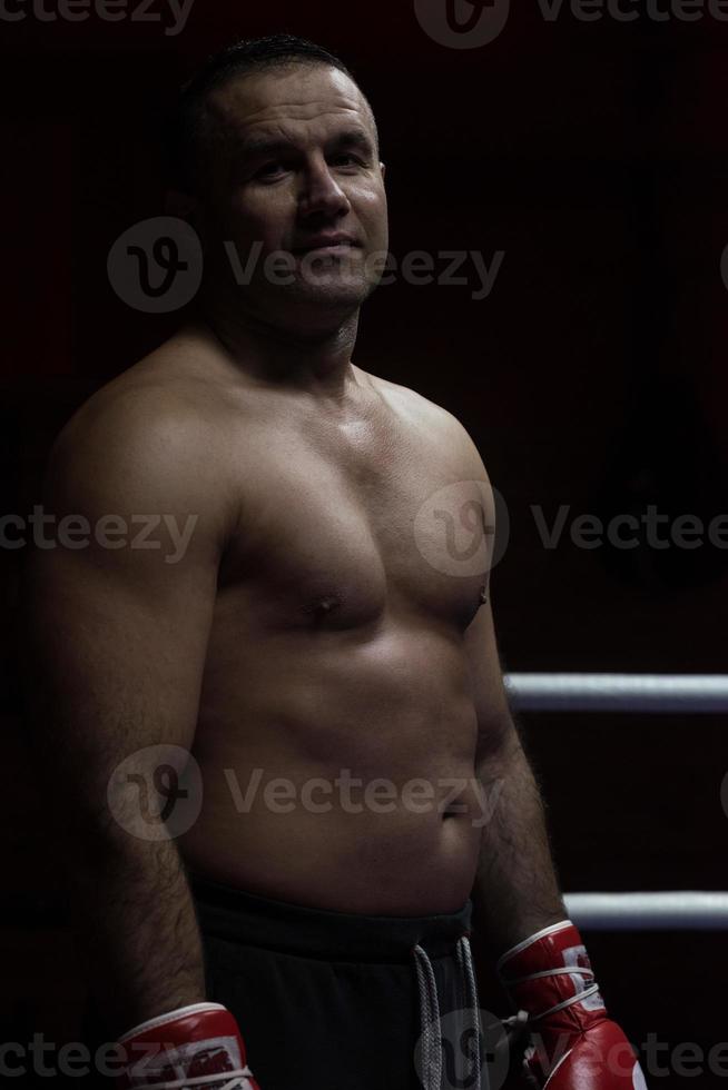 portrait of muscular professional kickboxer photo