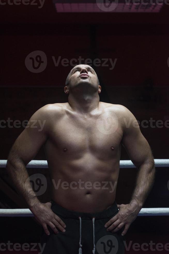 portrait of muscular professional kickboxer photo