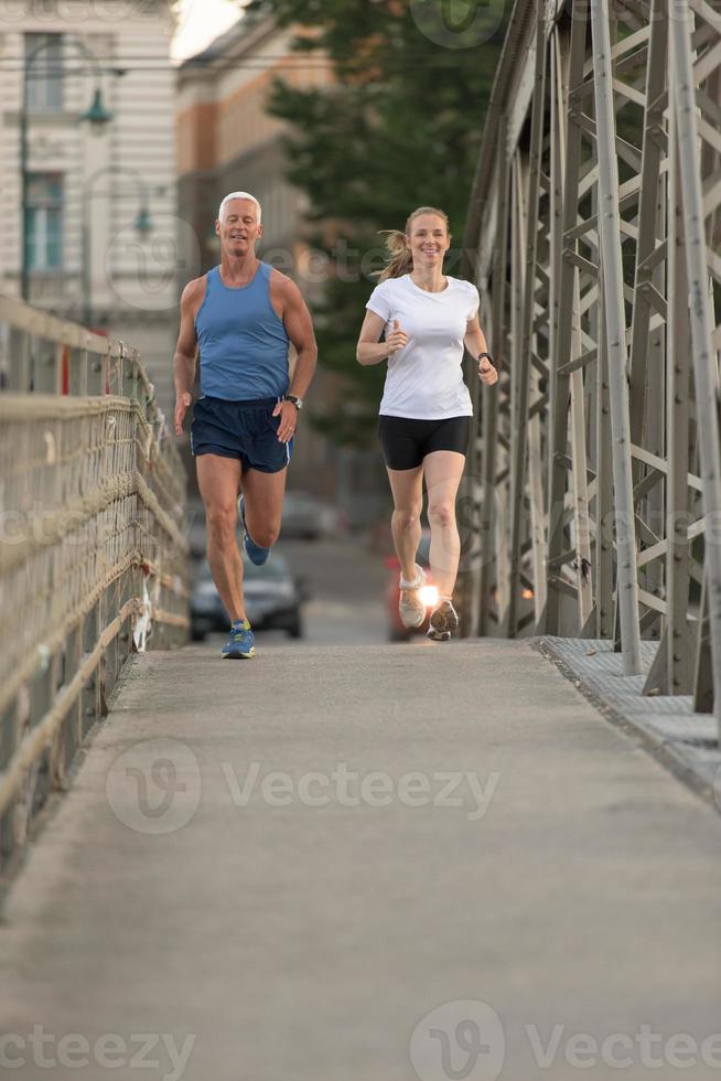 Couple jogging outside photo