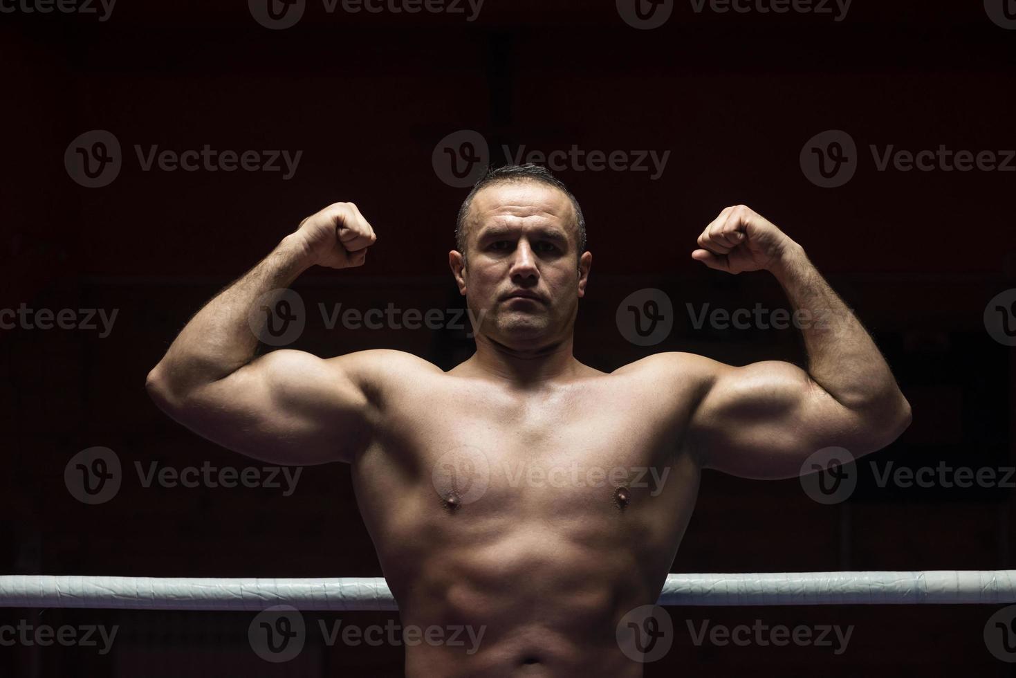 portrait of muscular professional kickboxer photo