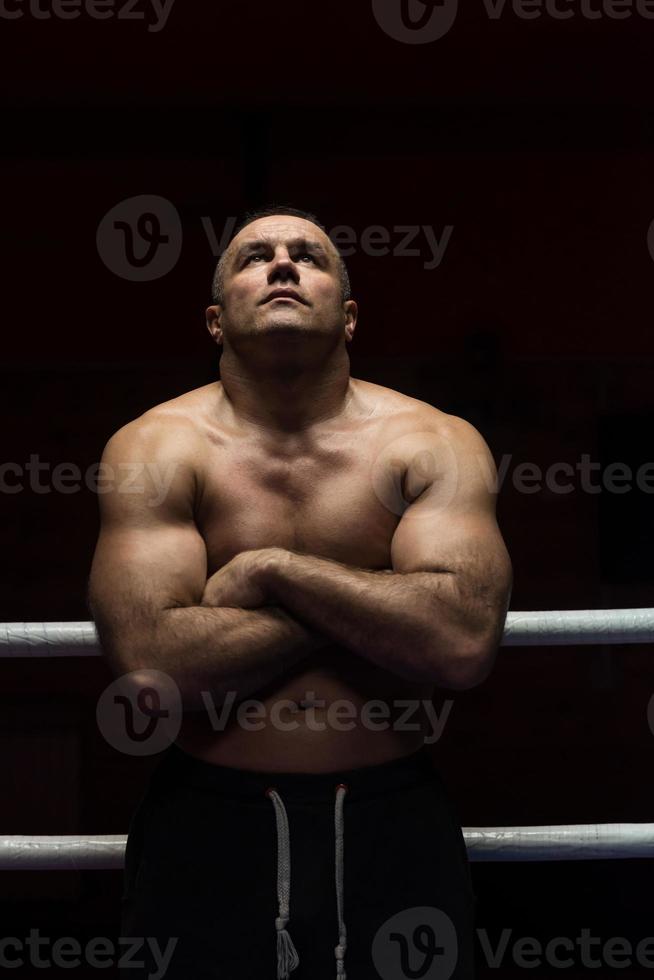 kickboxer with arms crossed photo