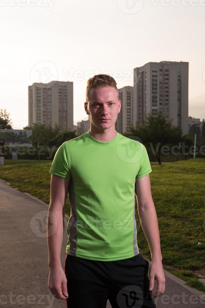 portrait of a young man on jogging photo