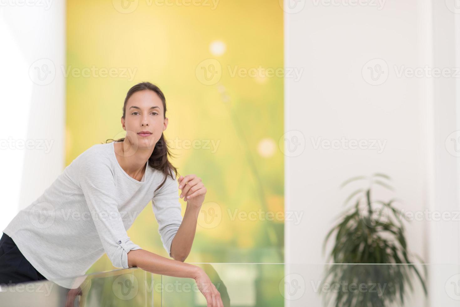 portrait of a young beautiful woman at home photo