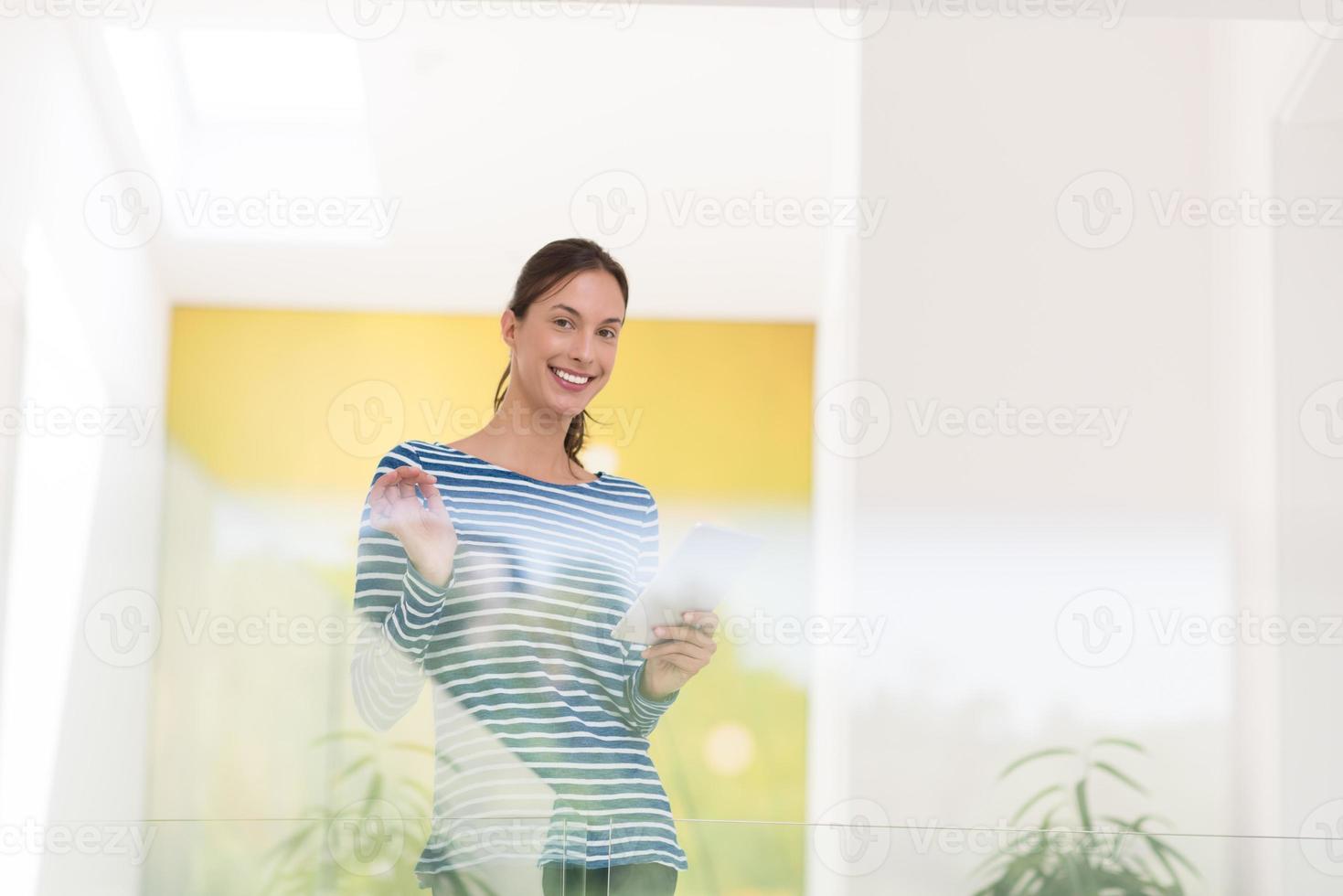 young woman at home websurfing photo