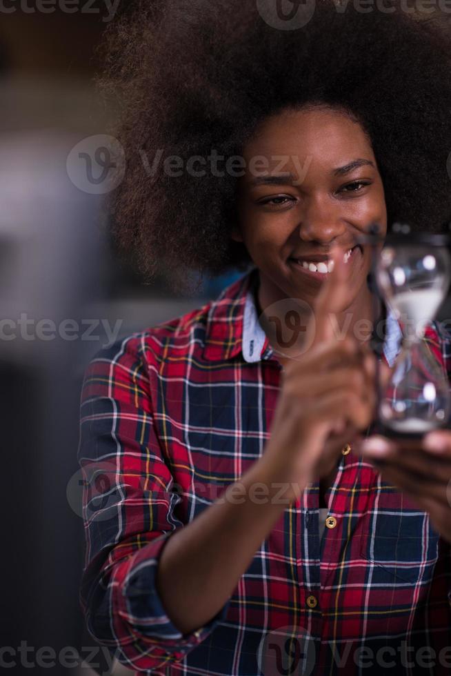 portrait of a young successful African-American woman in modern office photo