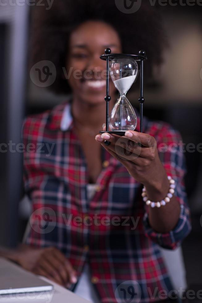 portrait of a young successful African-American woman in modern office photo