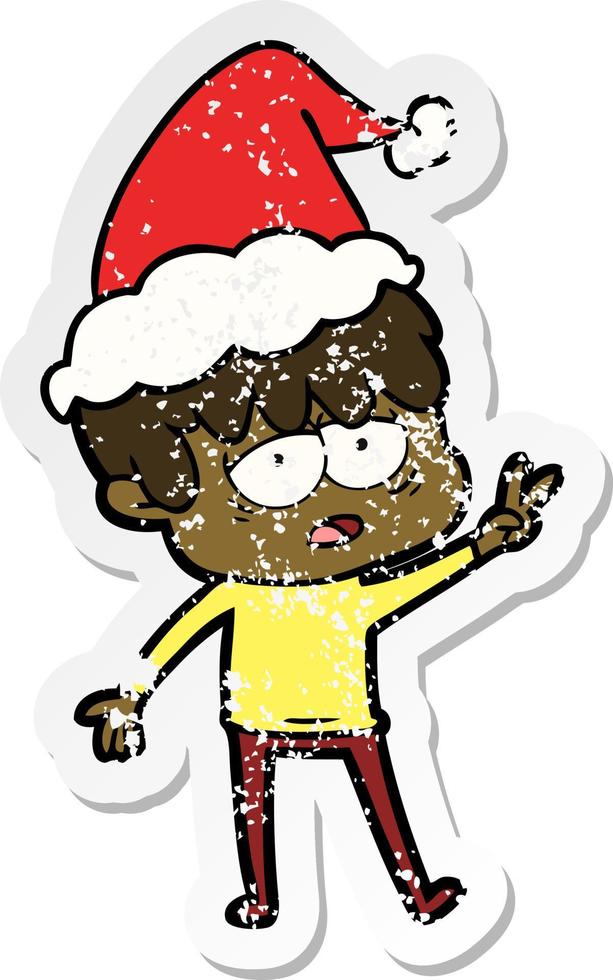 distressed sticker cartoon of a exhausted boy wearing santa hat vector