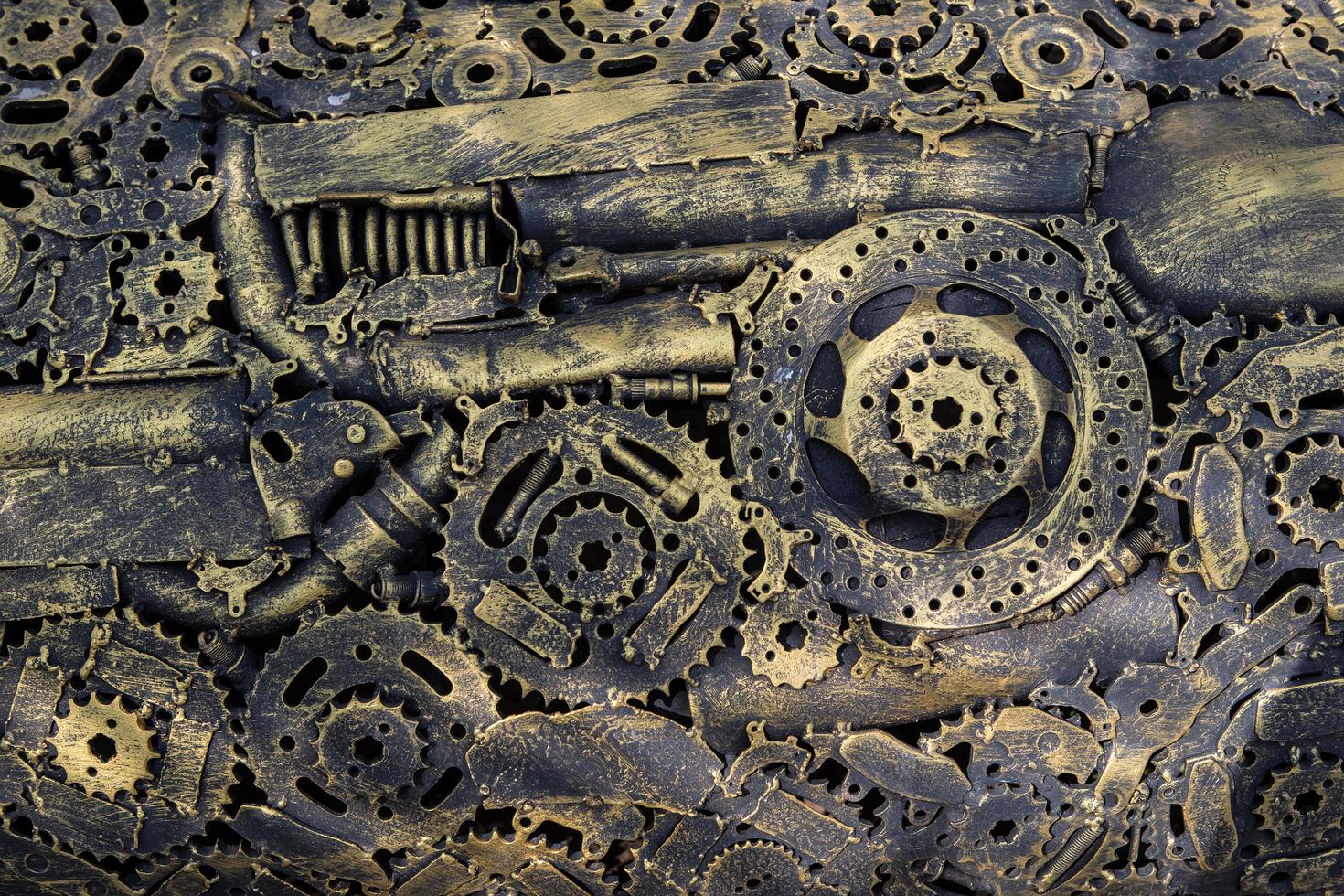 handicraft metal artwork from used spare parts background photo
