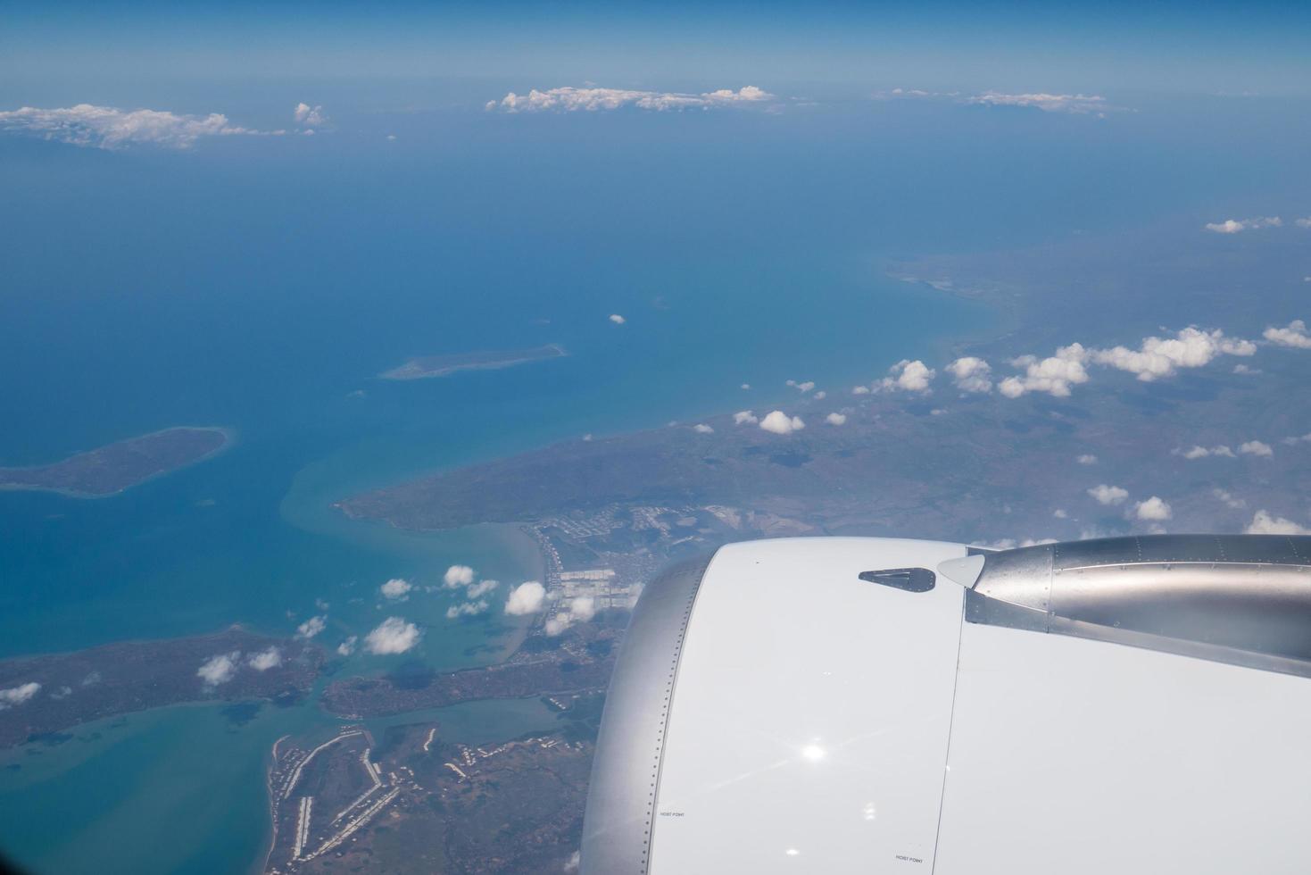 Bali island in tropical sea, veiw from airplane sight photo