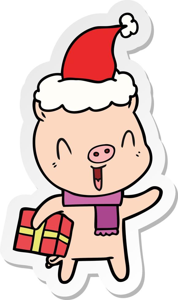 pegatina feliz caricatura de un cerdo con regalo de navidad con gorro de Papá Noel vector