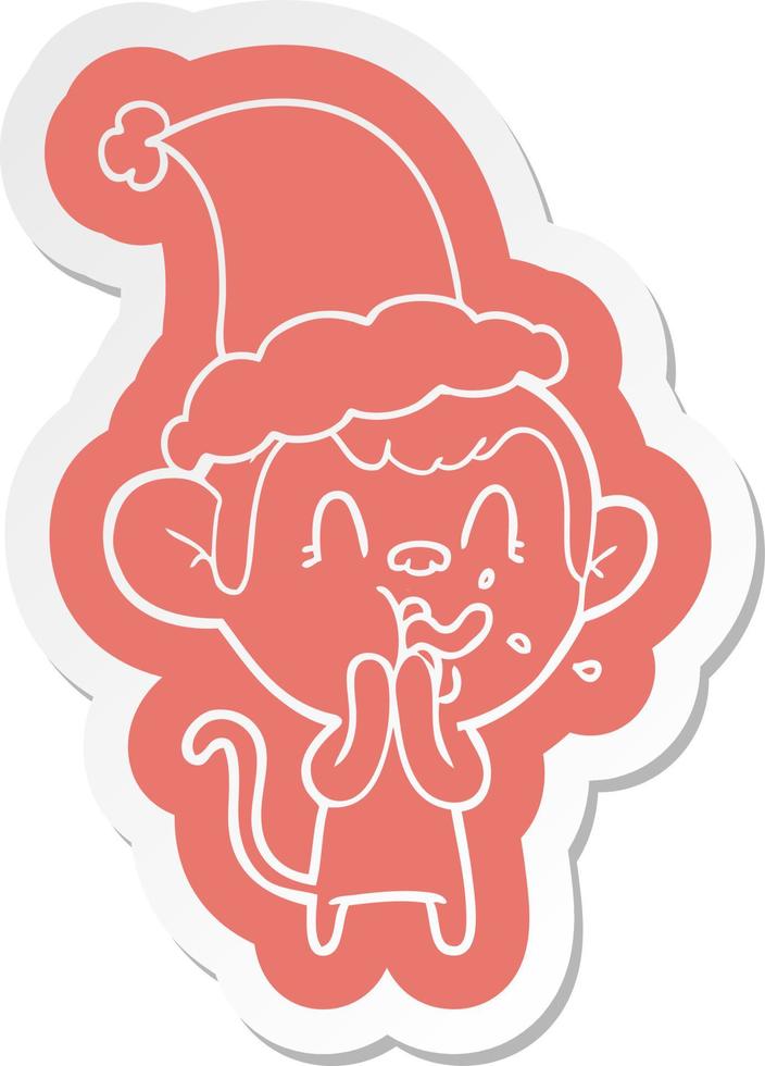 crazy cartoon  sticker of a monkey wearing santa hat vector