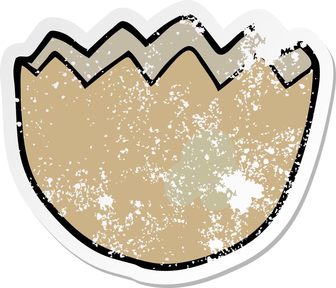 distressed sticker of a cartoon cracked eggshell vector