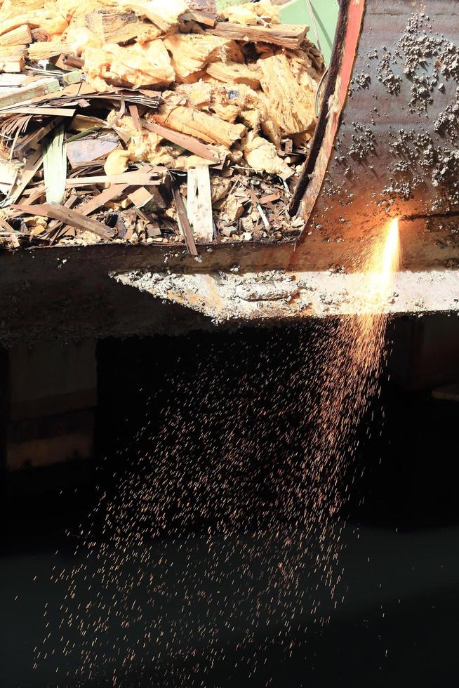 Workers are cutting steel photo