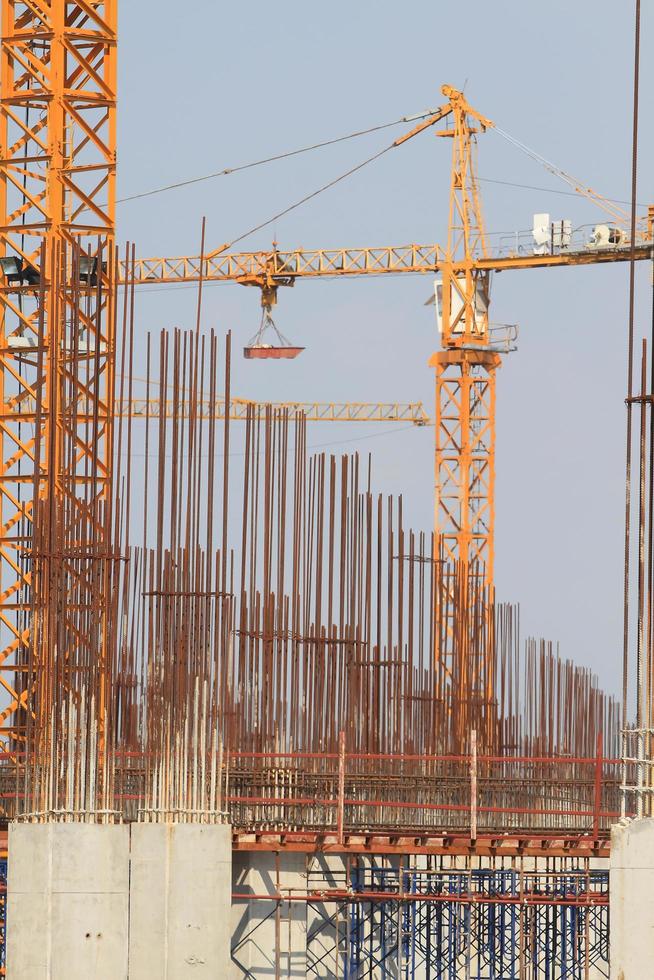 Construction site with enforced concrete steel frames rising up photo