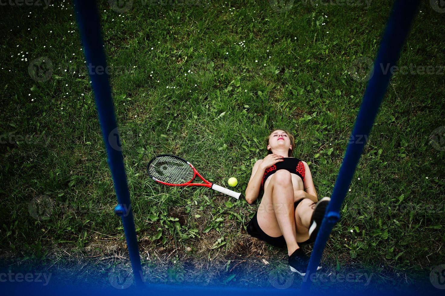 Beautiful sport woman tennis player with racket in sportswear costume. photo