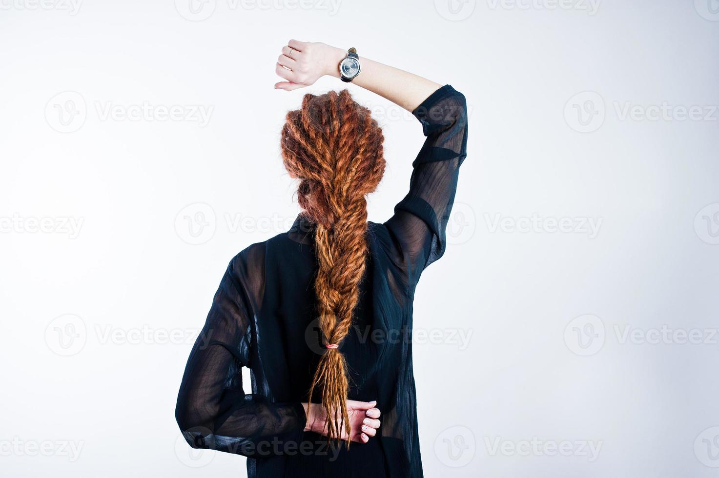 Studio shoot of back girl with dreads on white background. photo