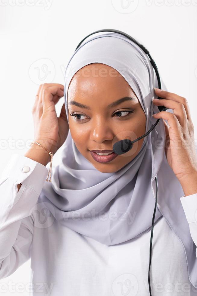 african customer representative business woman with phone headset photo