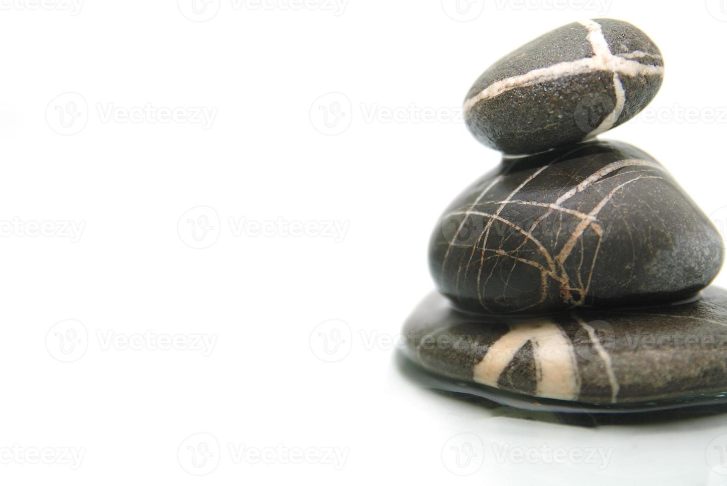 .zen stones with reflection isolated photo