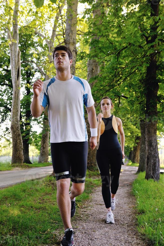 Young couple jogging photo