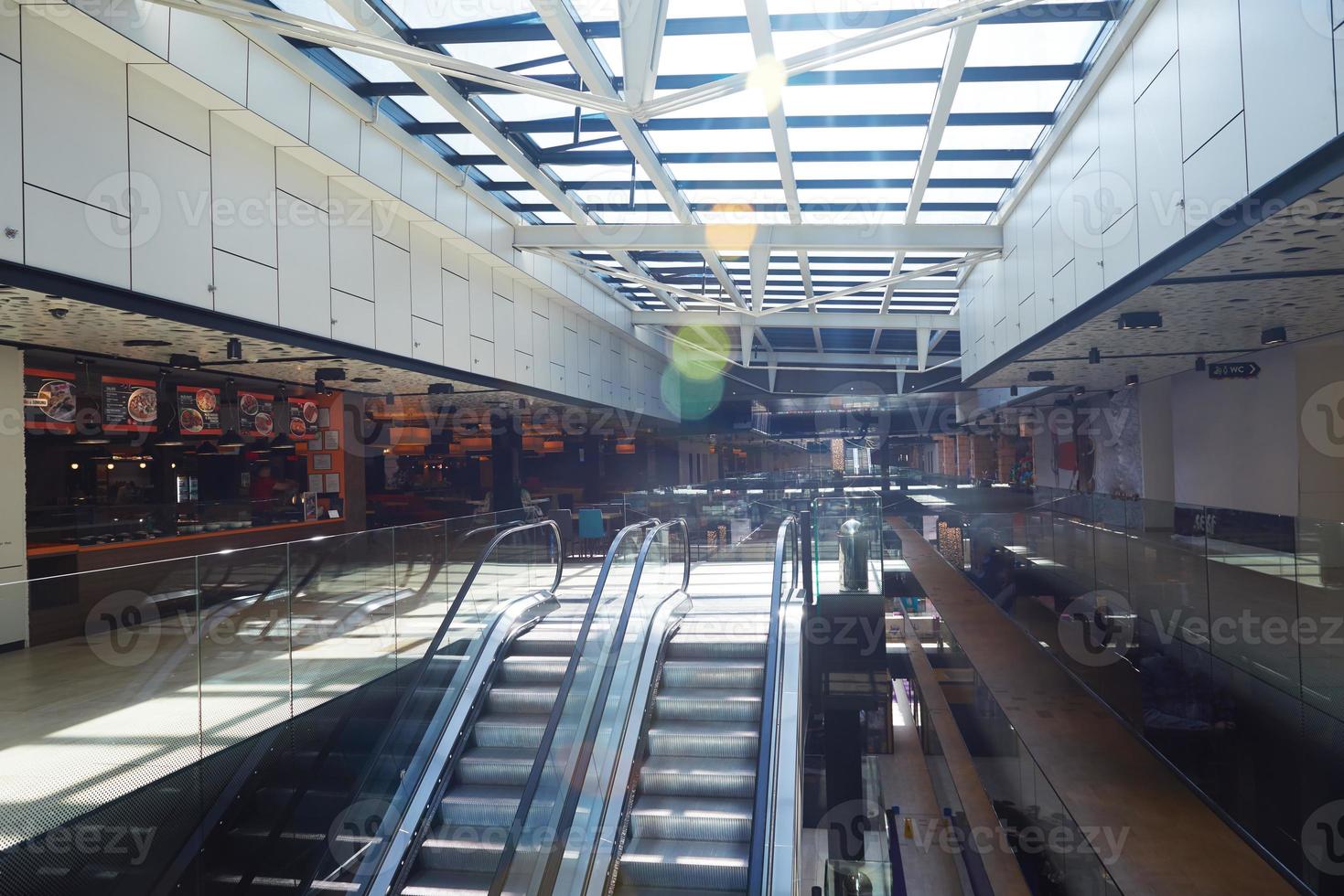 shopping mall interior  escalator photo