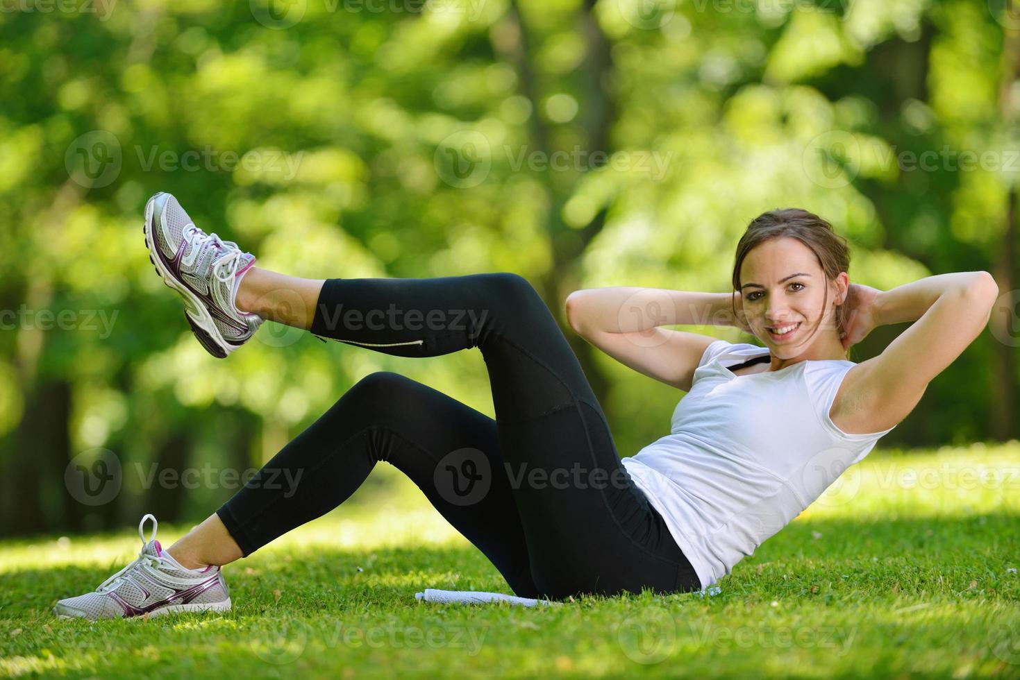 woman stretching before fitness photo