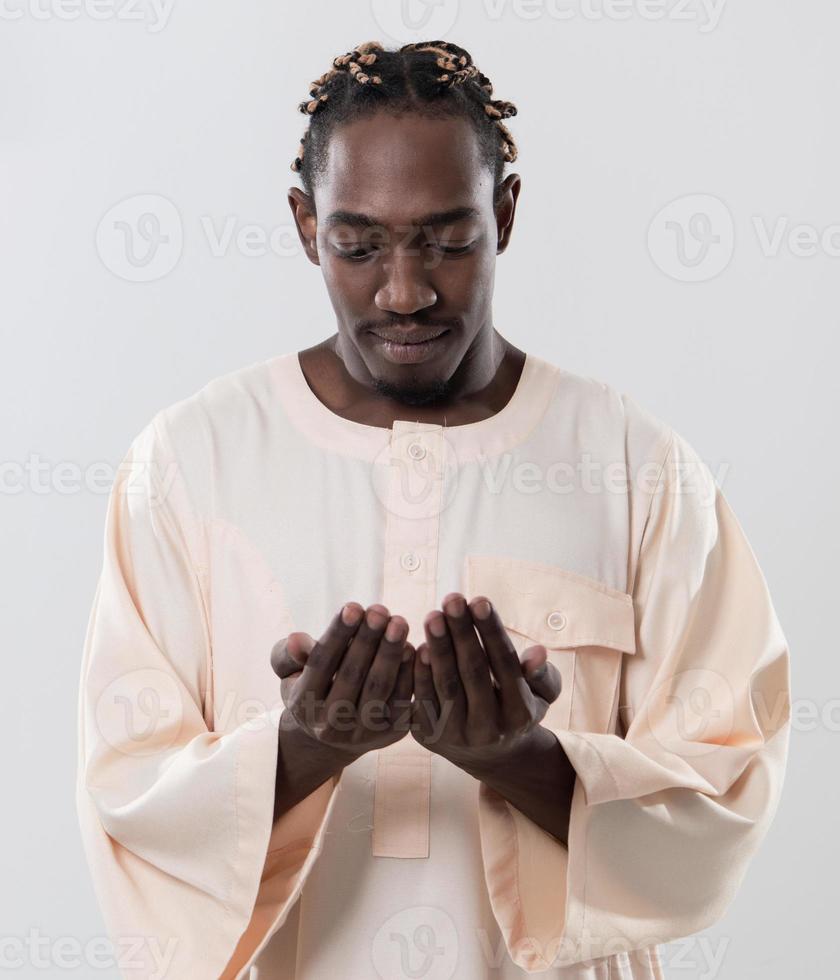 african man pray to Allah photo