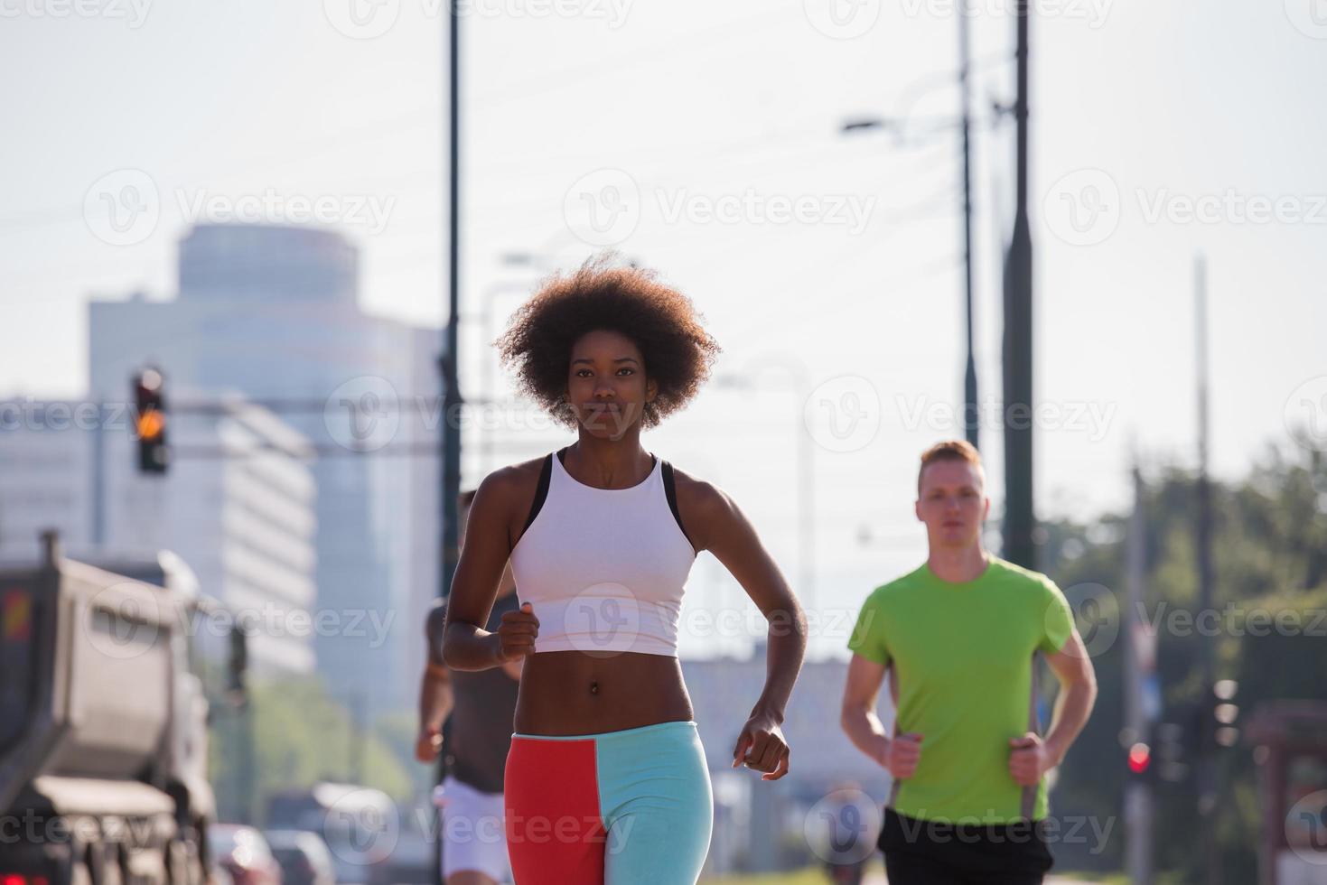 multiethnic group of people on the jogging photo