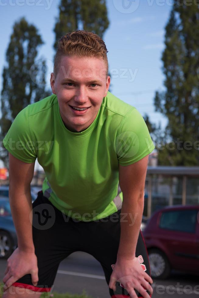 portrait of a young man on jogging photo