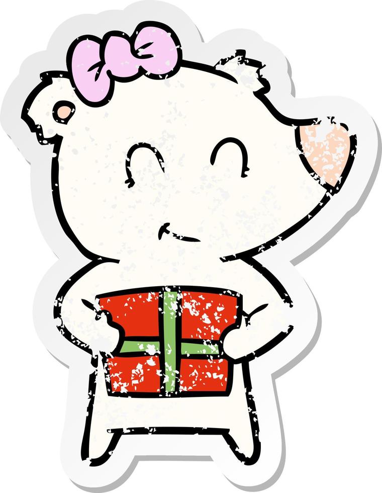 distressed sticker of a female polar bear with christmas present vector