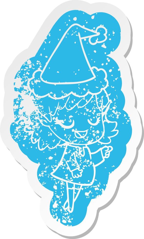 happy cartoon distressed sticker of a elf girl pointing wearing santa hat vector