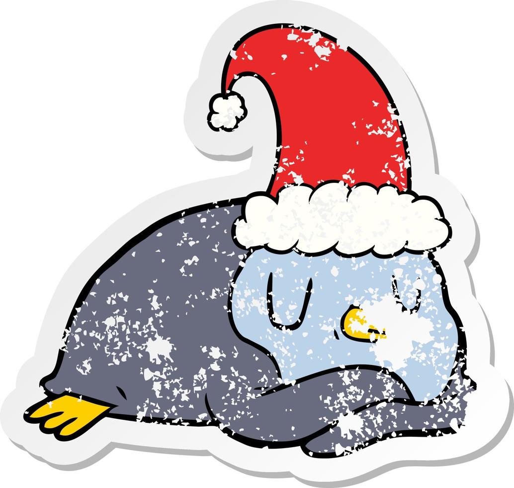 distressed sticker of a cartoon penguin wearing christmas hat vector