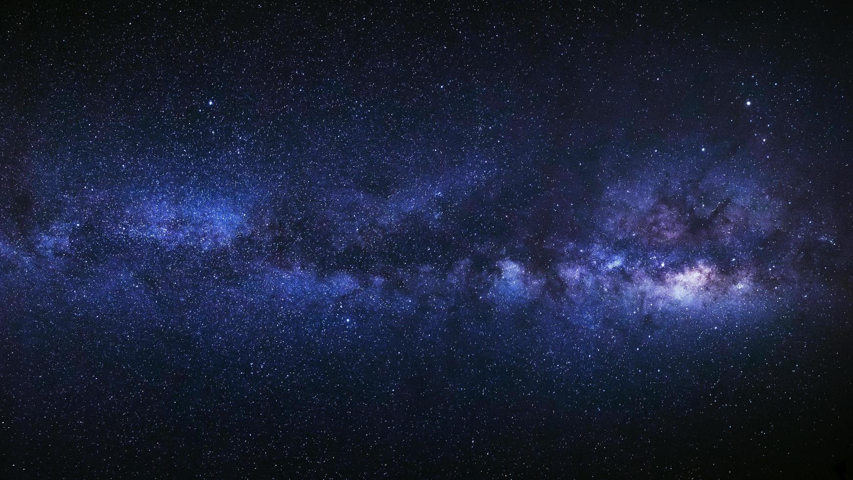 Panorama milky way galaxy, Long exposure photograph, with grain. photo