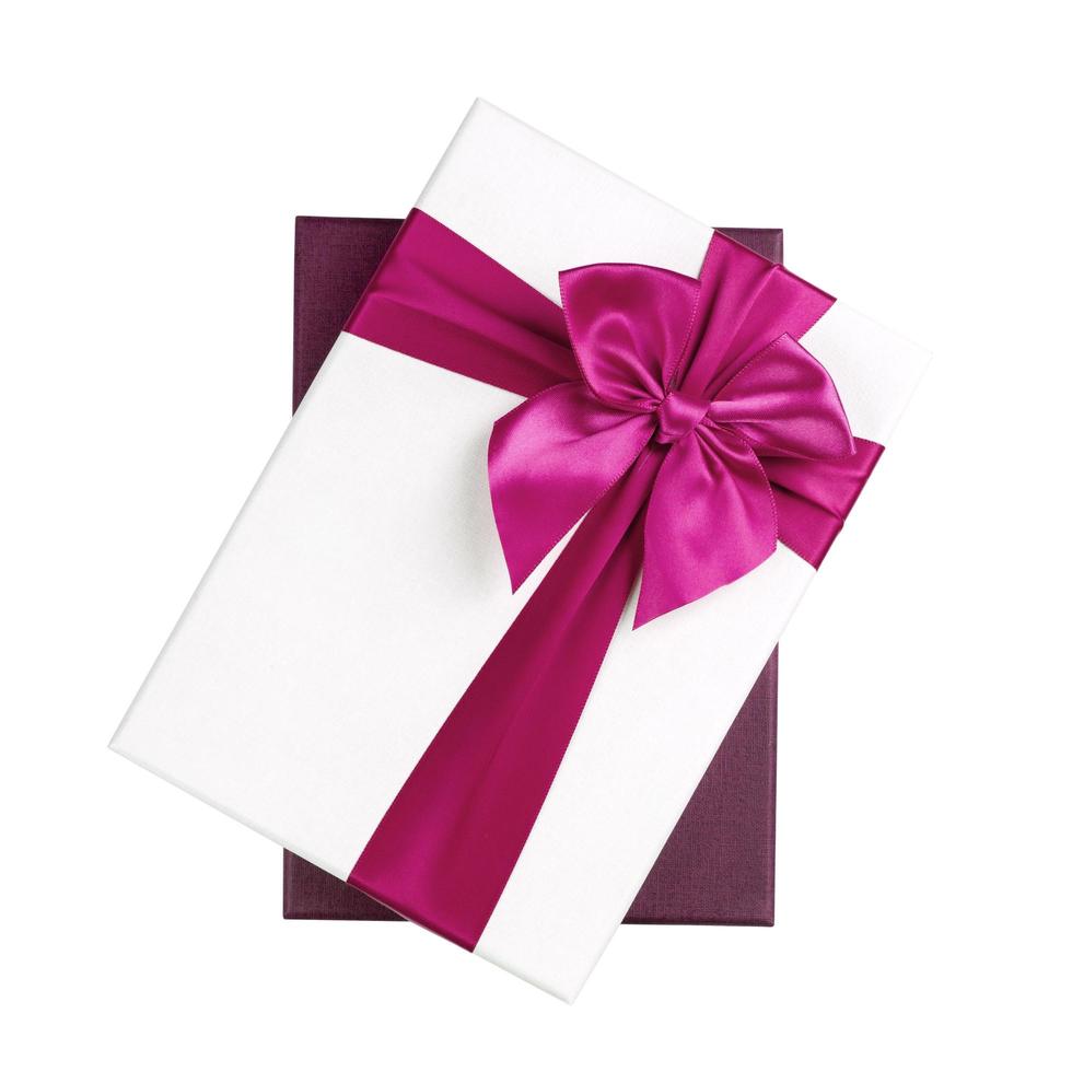 White gift Box with pink ribbon Isolated on white background photo