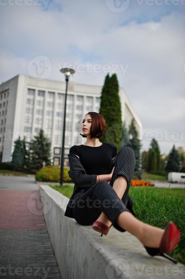 A tall leggy young beautiful and elegant model woman. photo