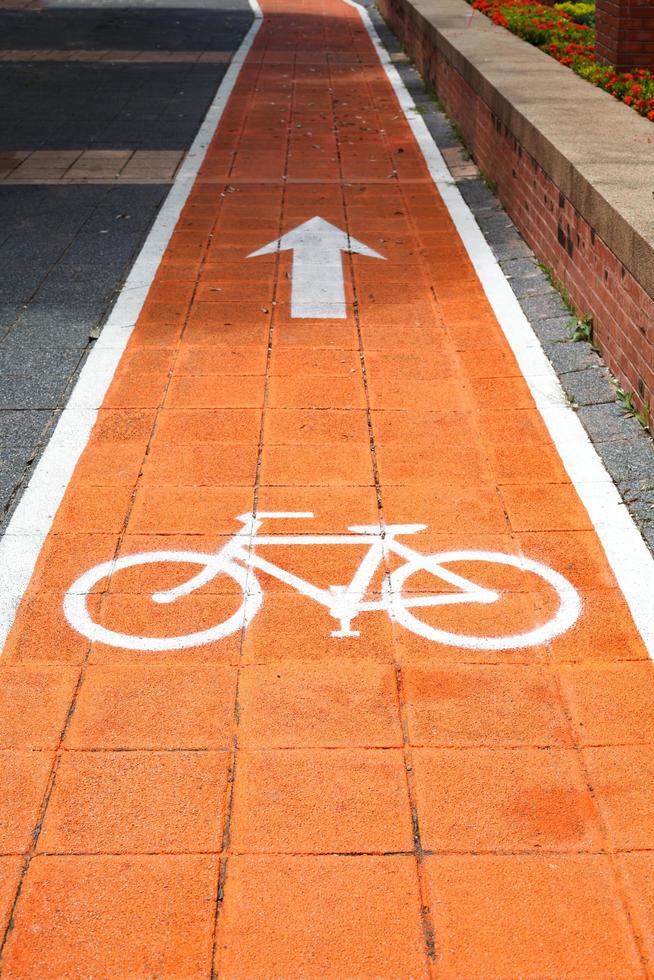 Bike lane and white bike symbol photo