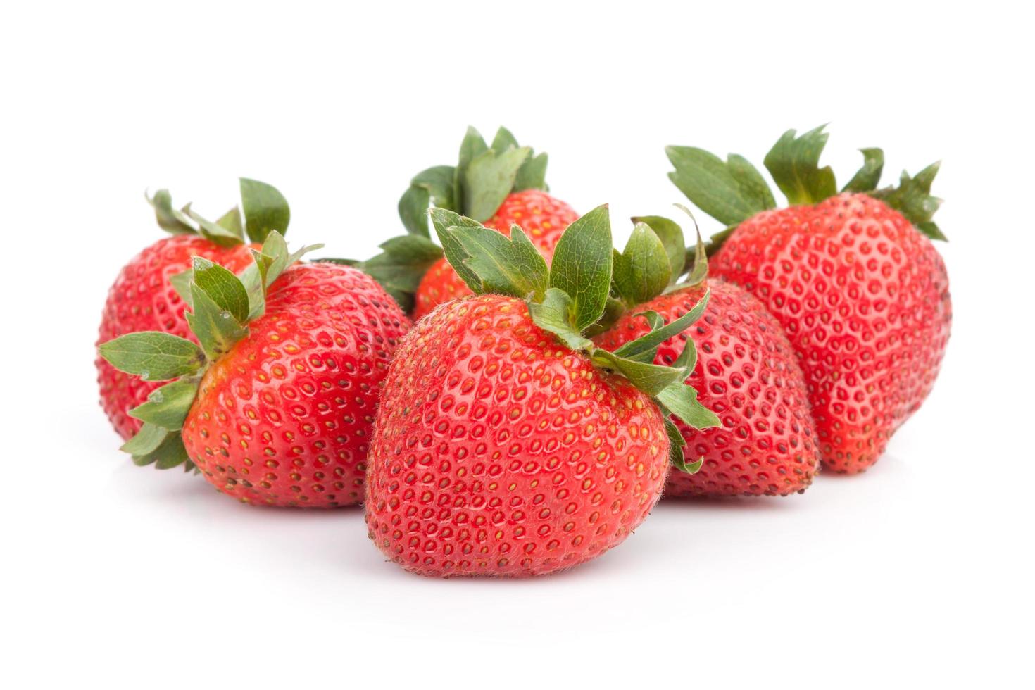 Fresh strawberries on white photo