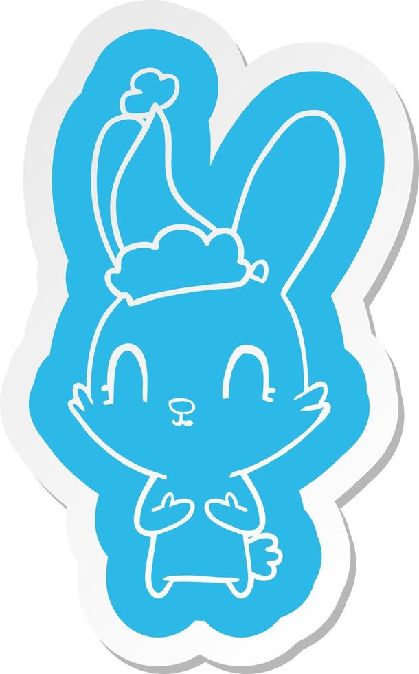 linda pegatina de dibujos animados de un conejo con gorro de Papá Noel  10438275 Vector en Vecteezy