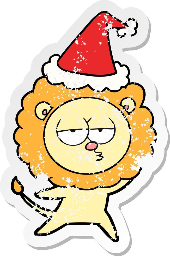 distressed sticker cartoon of a bored lion wearing santa hat vector
