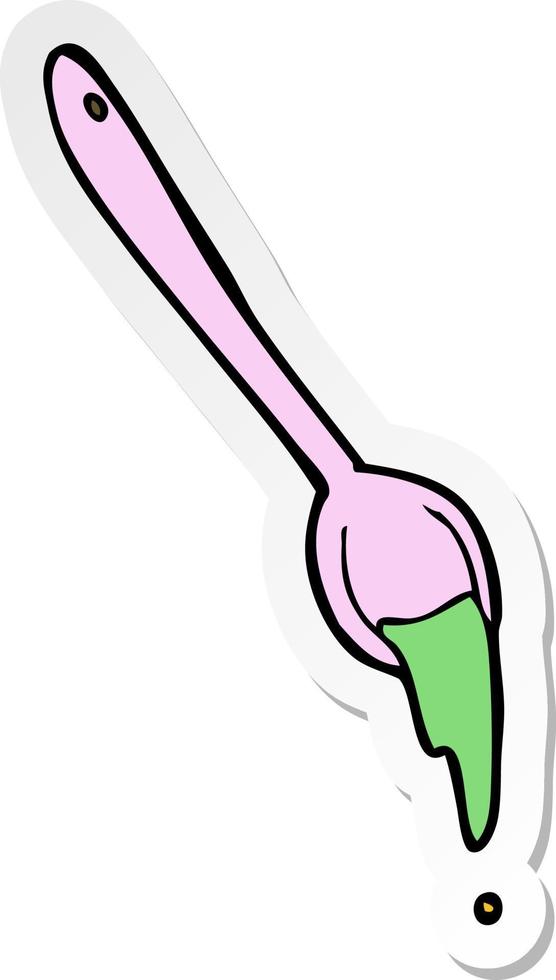 sticker of a cartoon spoon vector