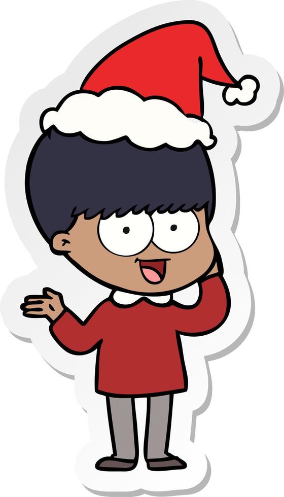 happy sticker cartoon of a boy wearing santa hat vector