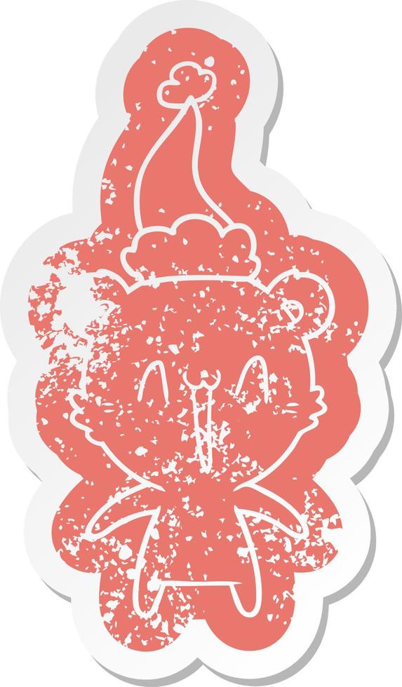 happy polar bear cartoon distressed sticker of a wearing santa hat vector